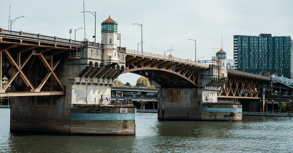 Daytime view of Burnside Bridge in Portland, Oregon, spanning the Willamette River.